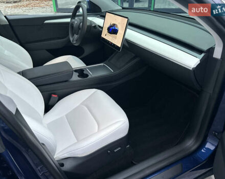 Синий Тесла Model Y, объемом двигателя 0 л и пробегом 48 тыс. км за 31600 $, фото 18 на Automoto.ua