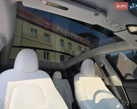 Синий Тесла Model Y, объемом двигателя 0 л и пробегом 51 тыс. км за 26400 $, фото 8 на Automoto.ua