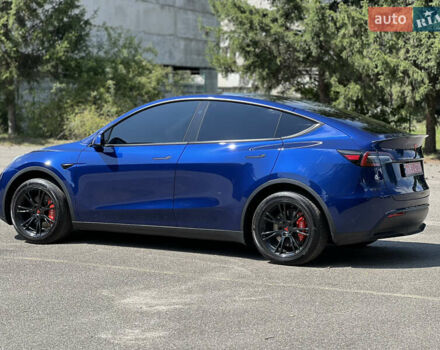 Синий Тесла Model Y, объемом двигателя 0 л и пробегом 9 тыс. км за 29999 $, фото 2 на Automoto.ua