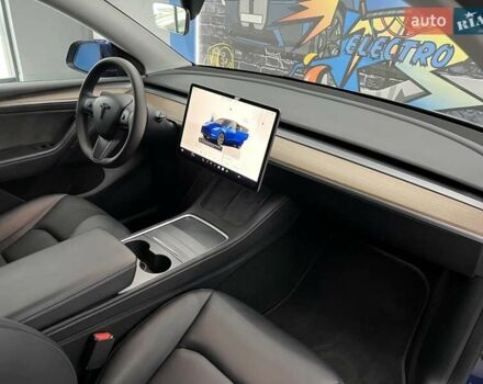 Синий Тесла Model Y, объемом двигателя 0 л и пробегом 8 тыс. км за 34199 $, фото 19 на Automoto.ua
