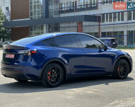 Синий Тесла Model Y, объемом двигателя 0 л и пробегом 9 тыс. км за 29999 $, фото 4 на Automoto.ua