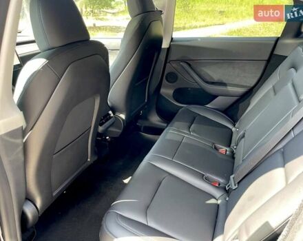 Синий Тесла Model Y, объемом двигателя 0 л и пробегом 24 тыс. км за 38800 $, фото 18 на Automoto.ua