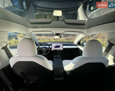 Синий Тесла Model Y, объемом двигателя 0 л и пробегом 10 тыс. км за 32500 $, фото 45 на Automoto.ua