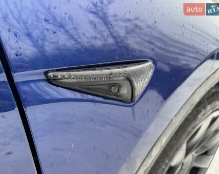 Синий Тесла Model Y, объемом двигателя 0 л и пробегом 81 тыс. км за 22500 $, фото 1 на Automoto.ua