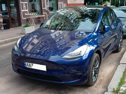 Синий Тесла Model Y, объемом двигателя 0 л и пробегом 63 тыс. км за 23000 $, фото 1 на Automoto.ua