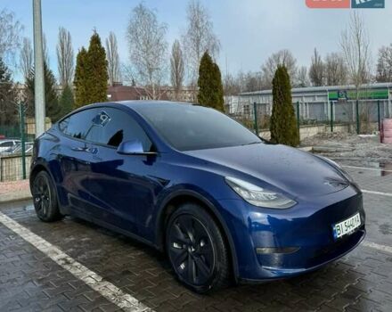 Синий Тесла Model Y, объемом двигателя 0 л и пробегом 77 тыс. км за 22000 $, фото 1 на Automoto.ua
