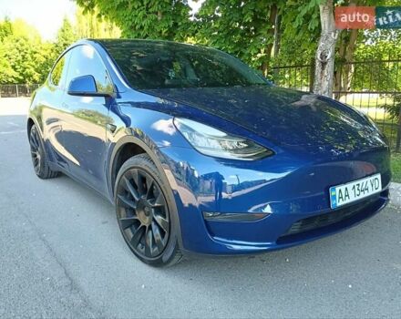 Синий Тесла Model Y, объемом двигателя 0 л и пробегом 65 тыс. км за 25000 $, фото 1 на Automoto.ua