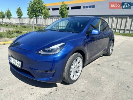 Синий Тесла Model Y, объемом двигателя 0 л и пробегом 91 тыс. км за 28000 $, фото 1 на Automoto.ua