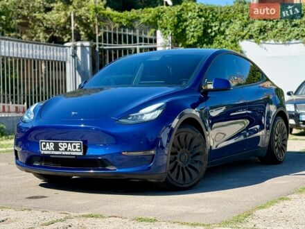 Синий Тесла Model Y, объемом двигателя 0 л и пробегом 70 тыс. км за 22999 $, фото 1 на Automoto.ua
