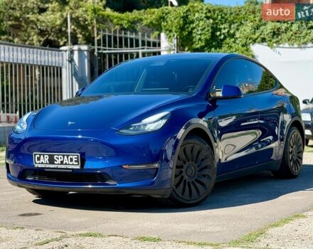 Синий Тесла Model Y, объемом двигателя 0 л и пробегом 70 тыс. км за 22999 $, фото 1 на Automoto.ua