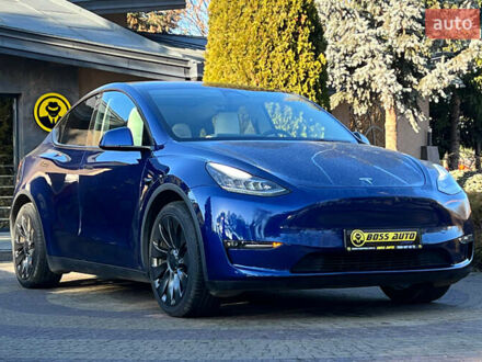 Синій Тесла Model Y, об'ємом двигуна 0 л та пробігом 64 тис. км за 26900 $, фото 1 на Automoto.ua