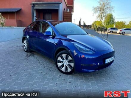 Синий Тесла Model Y, объемом двигателя 0.38 л и пробегом 66 тыс. км за 23000 $, фото 1 на Automoto.ua