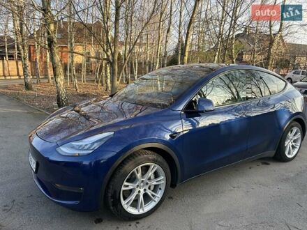 Синий Тесла Model Y, объемом двигателя 0 л и пробегом 79 тыс. км за 24950 $, фото 1 на Automoto.ua