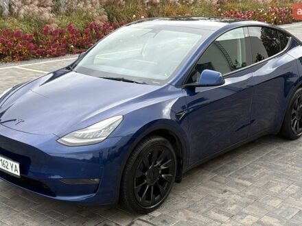 Синій Тесла Model Y, об'ємом двигуна 0 л та пробігом 73 тис. км за 22600 $, фото 1 на Automoto.ua