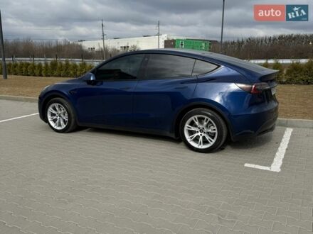 Синий Тесла Model Y, объемом двигателя 0 л и пробегом 62 тыс. км за 27900 $, фото 1 на Automoto.ua