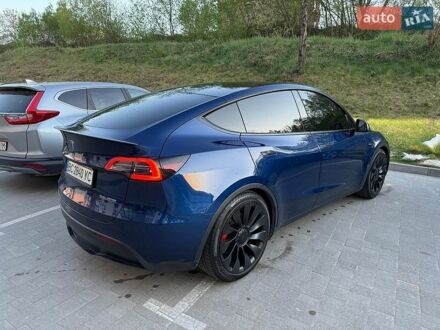 Синий Тесла Model Y, объемом двигателя 0 л и пробегом 99 тыс. км за 22999 $, фото 1 на Automoto.ua