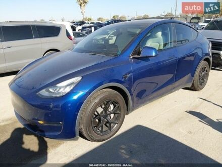 Синий Тесла Model Y, объемом двигателя 0 л и пробегом 108 тыс. км за 8800 $, фото 1 на Automoto.ua