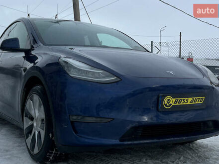 Синій Тесла Model Y, об'ємом двигуна 0 л та пробігом 74 тис. км за 26700 $, фото 1 на Automoto.ua