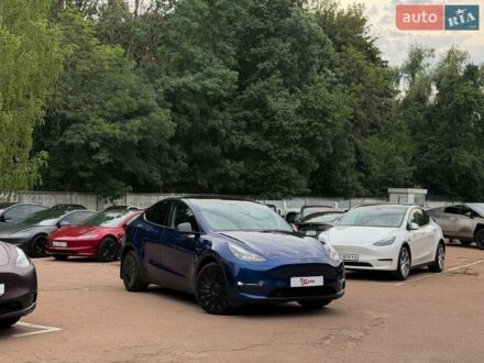 Синий Тесла Model Y, объемом двигателя 0 л и пробегом 52 тыс. км за 27999 $, фото 1 на Automoto.ua