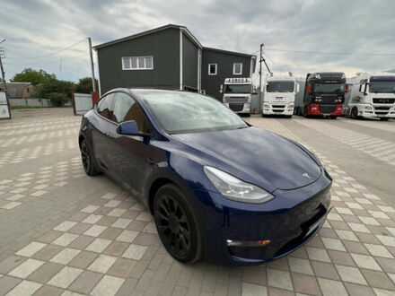 Синий Тесла Model Y, объемом двигателя 0 л и пробегом 54 тыс. км за 27500 $, фото 1 на Automoto.ua