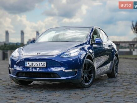 Синий Тесла Model Y, объемом двигателя 0 л и пробегом 74 тыс. км за 28000 $, фото 1 на Automoto.ua