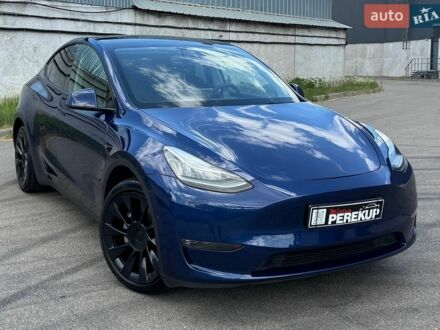 Синий Тесла Model Y, объемом двигателя 0 л и пробегом 47 тыс. км за 26999 $, фото 1 на Automoto.ua