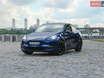 Синій Тесла Model Y, об'ємом двигуна 0 л та пробігом 74 тис. км за 24900 $, фото 1 на Automoto.ua