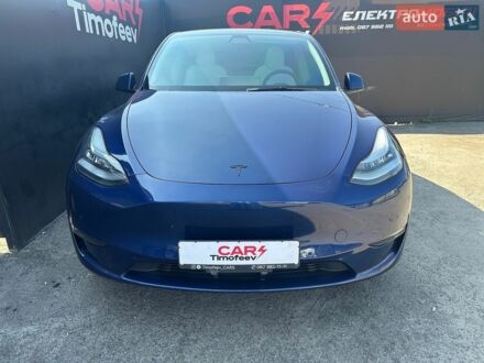 Синий Тесла Model Y, объемом двигателя 0 л и пробегом 60 тыс. км за 26500 $, фото 1 на Automoto.ua