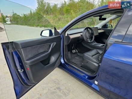 Синий Тесла Model Y, объемом двигателя 0 л и пробегом 24 тыс. км за 26200 $, фото 1 на Automoto.ua