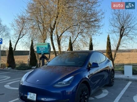 Синий Тесла Model Y, объемом двигателя 0 л и пробегом 61 тыс. км за 30000 $, фото 1 на Automoto.ua