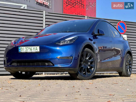 Синий Тесла Model Y, объемом двигателя 0 л и пробегом 45 тыс. км за 29900 $, фото 1 на Automoto.ua
