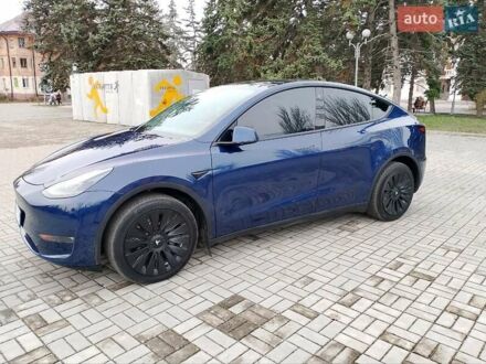 Синий Тесла Model Y, объемом двигателя 0 л и пробегом 54 тыс. км за 30000 $, фото 1 на Automoto.ua