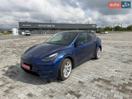 Синий Тесла Model Y, объемом двигателя 0 л и пробегом 97 тыс. км за 23700 $, фото 1 на Automoto.ua