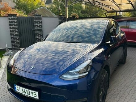 Синий Тесла Model Y, объемом двигателя 0 л и пробегом 93 тыс. км за 26900 $, фото 1 на Automoto.ua
