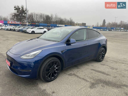 Синий Тесла Model Y, объемом двигателя 0 л и пробегом 35 тыс. км за 34500 $, фото 1 на Automoto.ua