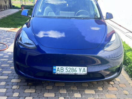Синий Тесла Model Y, объемом двигателя 0 л и пробегом 58 тыс. км за 26000 $, фото 1 на Automoto.ua