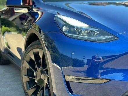Синий Тесла Model Y, объемом двигателя 0 л и пробегом 100 тыс. км за 23850 $, фото 1 на Automoto.ua