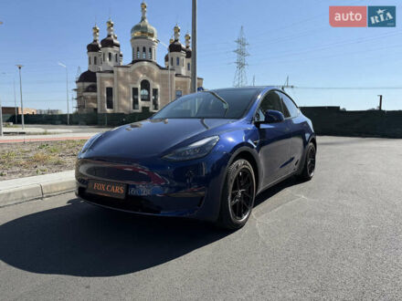 Синий Тесла Model Y, объемом двигателя 0 л и пробегом 54 тыс. км за 26500 $, фото 1 на Automoto.ua