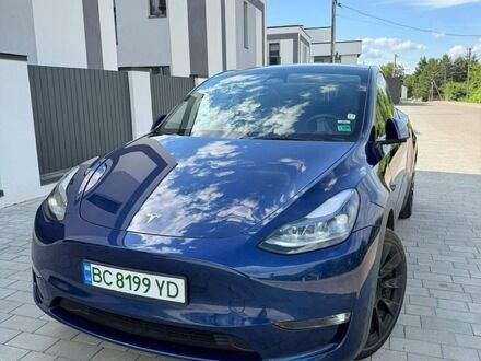 Синий Тесла Model Y, объемом двигателя 0 л и пробегом 57 тыс. км за 27950 $, фото 1 на Automoto.ua