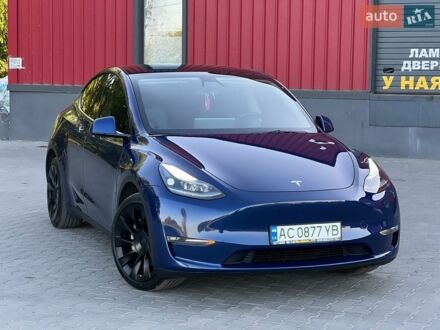 Синий Тесла Model Y, объемом двигателя 0 л и пробегом 147 тыс. км за 25999 $, фото 1 на Automoto.ua