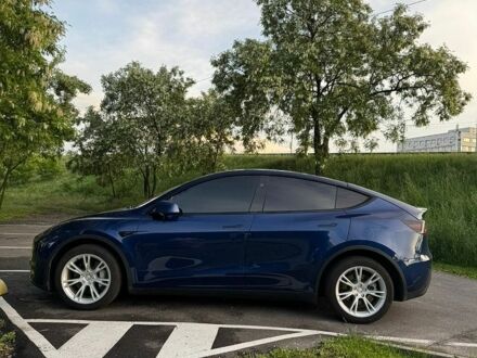Синій Тесла Model Y, об'ємом двигуна 0 л та пробігом 57 тис. км за 28500 $, фото 1 на Automoto.ua