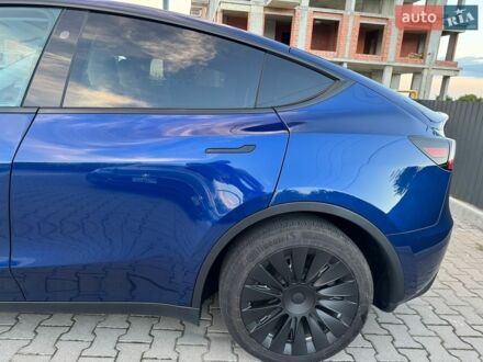 Синий Тесла Model Y, объемом двигателя 0 л и пробегом 41 тыс. км за 28900 $, фото 1 на Automoto.ua