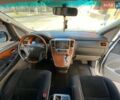 Білий Тойота Алфард, об'ємом двигуна 2.4 л та пробігом 180 тис. км за 15000 $, фото 2 на Automoto.ua