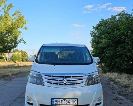 Белый Тойота Алфард, объемом двигателя 2.4 л и пробегом 142 тыс. км за 13000 $, фото 1 на Automoto.ua