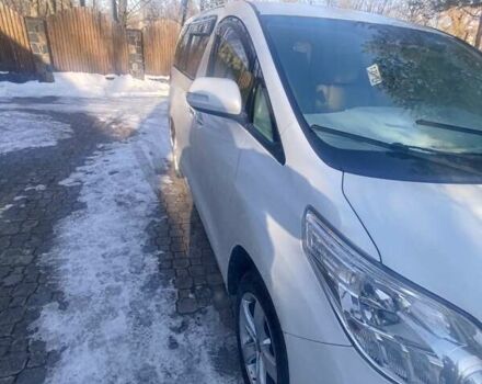 Белый Тойота Алфард, объемом двигателя 2.36 л и пробегом 141 тыс. км за 9900 $, фото 1 на Automoto.ua
