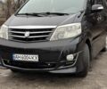 Чорний Тойота Алфард, об'ємом двигуна 2.4 л та пробігом 95 тис. км за 15700 $, фото 1 на Automoto.ua