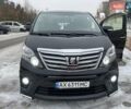 Черный Тойота Алфард, объемом двигателя 2.4 л и пробегом 121 тыс. км за 19000 $, фото 1 на Automoto.ua