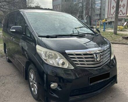 Черный Тойота Алфард, объемом двигателя 2.4 л и пробегом 103 тыс. км за 19000 $, фото 1 на Automoto.ua
