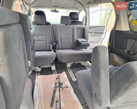 Серый Тойота Алфард, объемом двигателя 3 л и пробегом 205 тыс. км за 11000 $, фото 8 на Automoto.ua