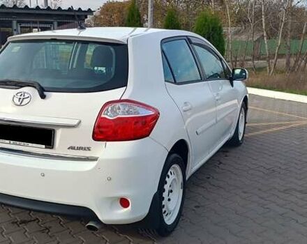 Білий Тойота Ауріс, об'ємом двигуна 1.6 л та пробігом 96 тис. км за 10600 $, фото 7 на Automoto.ua